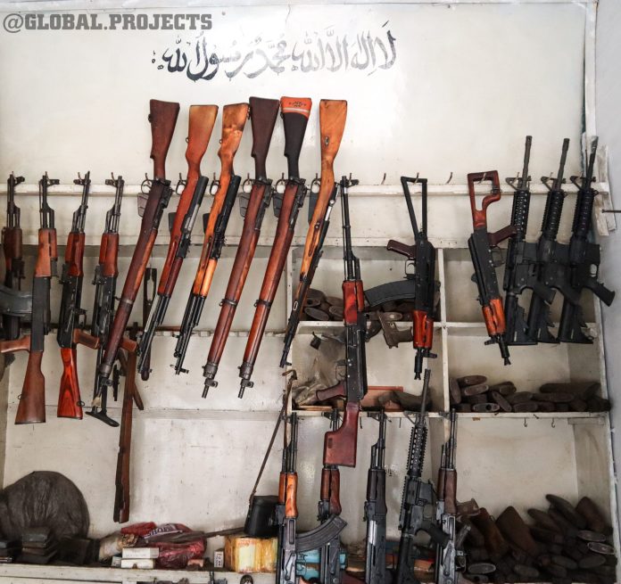 Taliban fighters guns